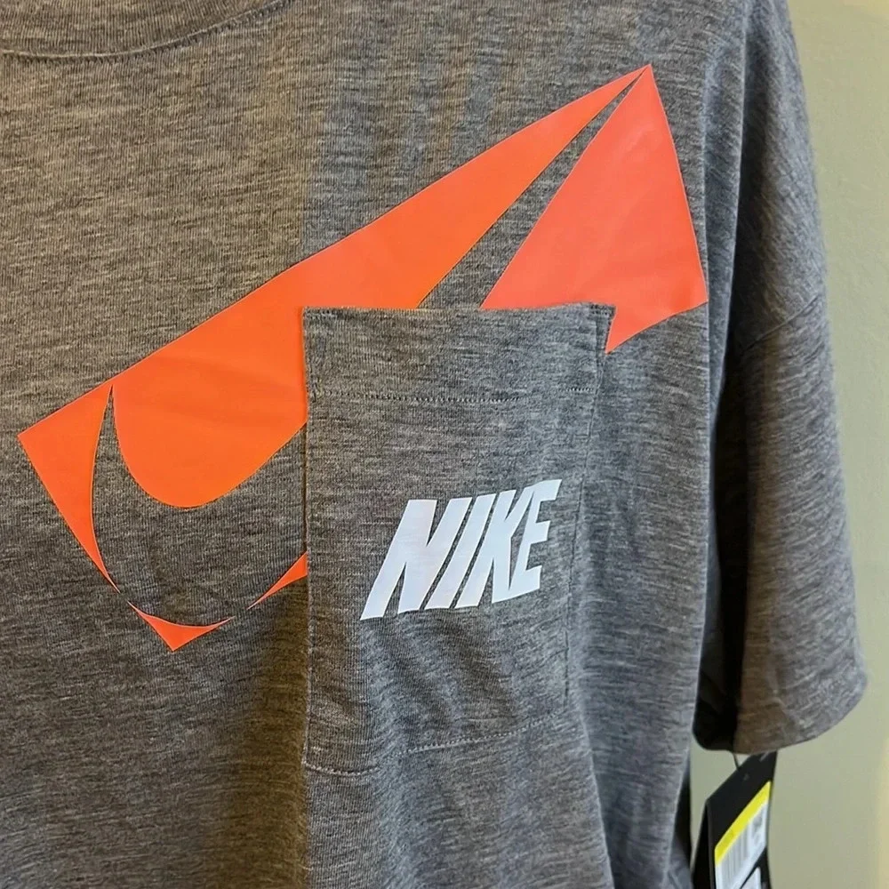 Nike dri-fit oversized gray training crop front pocket logo T-shirt
